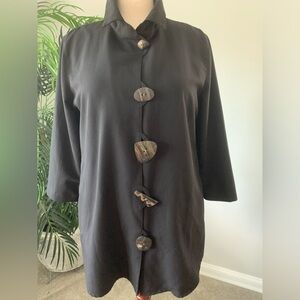 Woman's black swing style jacket by Caroline Rose